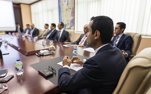 A Sweet Garden executive at the boardroom table